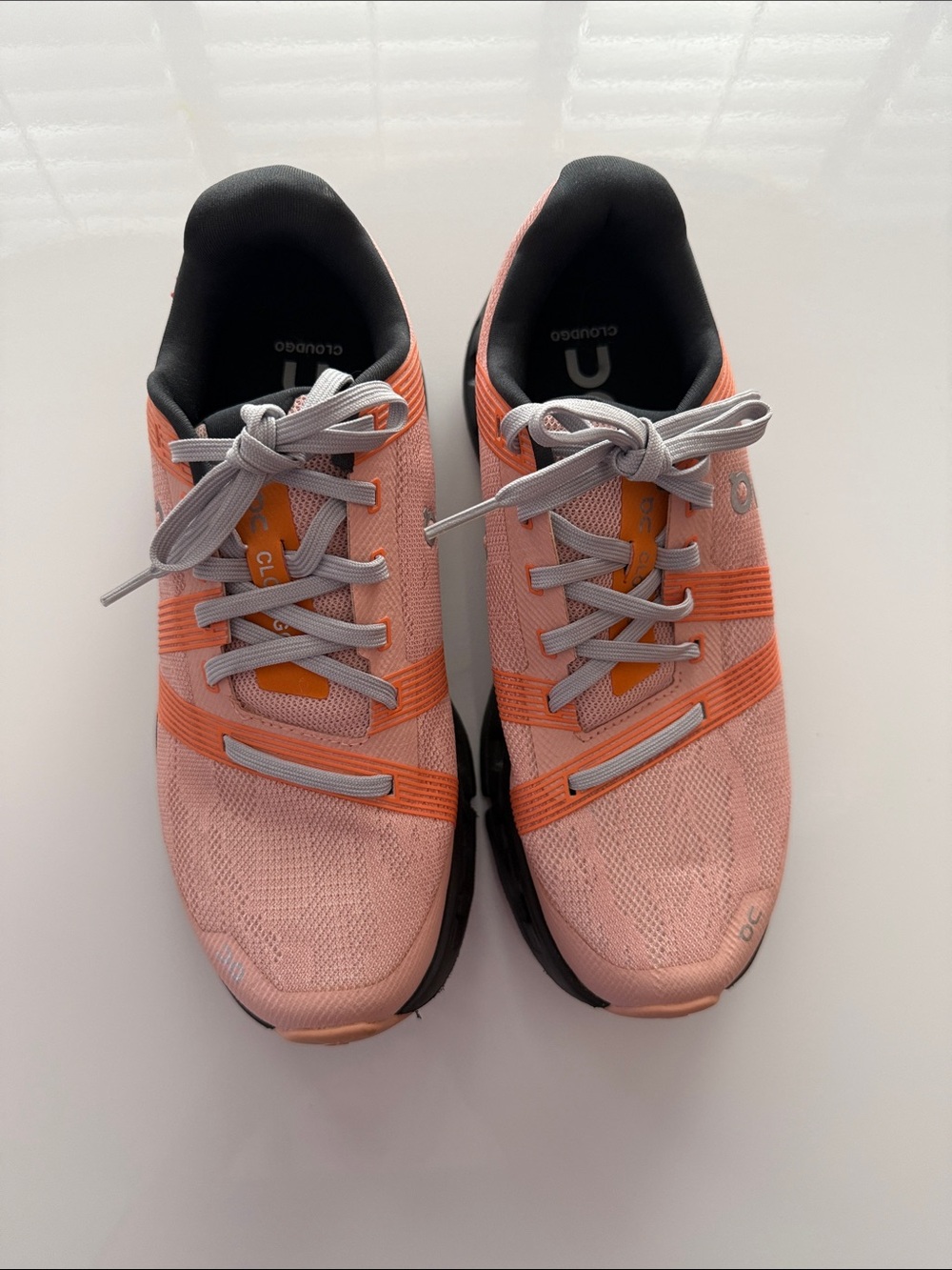 On Running Coral Pink and Orange Women’s Athletic Shoes